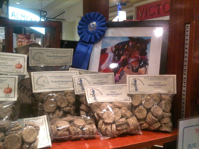 multiple bags of Bozzy's Blue Ribbon Horse Treats on a counter